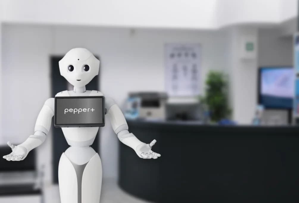 Pepper+ with open arms at an office reception